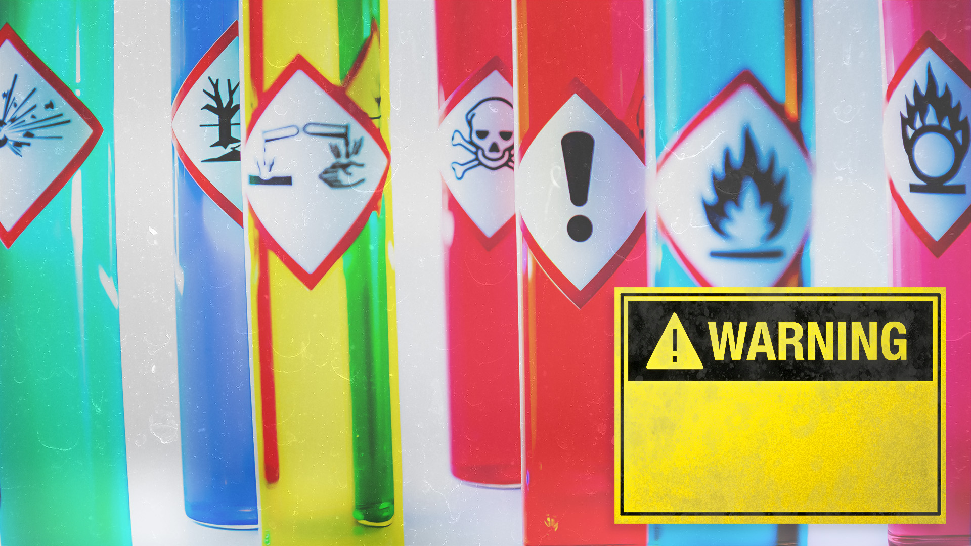 Bright coloured chemicals with COSHH warning labels 